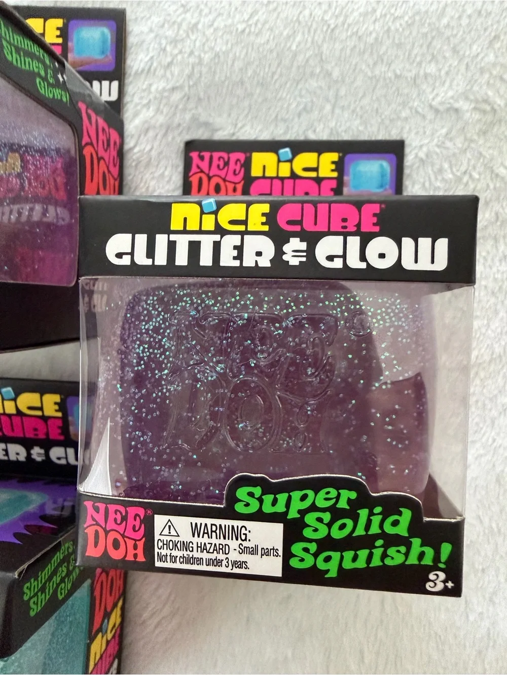 Set of Needoh Nice Cube Glitter & Glow Squishy Toys - Purple and Blue